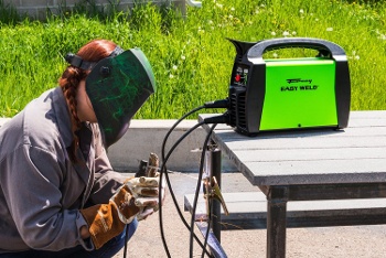 a stick welder on a table